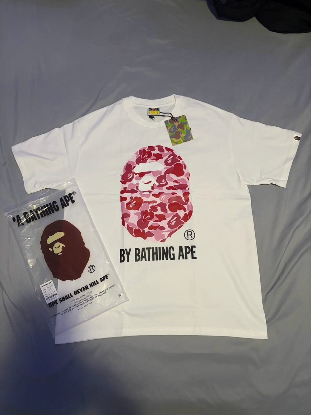 BAPE White Short-Sleeve Tee with Pink Camo Ape Logo